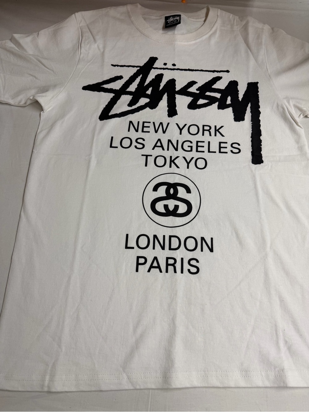 Stussy White T-Shirt with Black City Logo Print